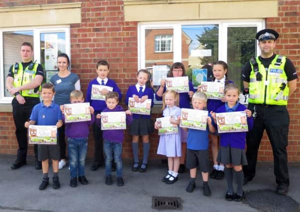 Students from Gretton Primary School with their certificates for taking part in the Park and Stride scheme