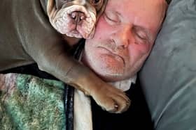Ain’t nothing but a hound, Doc: David Lindsay with his British Bulldog puppy, Harley. 