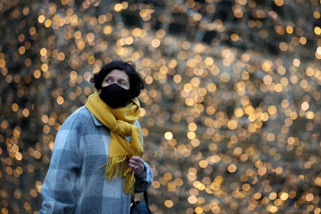 Failure to cover your face could see you hit with a £200 fine (image: Getty Images)