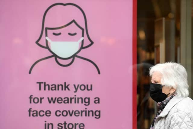 Rules on face masks are to be extended in an attempt to stop tougher Christmas restrictions (Photo: OLI SCARFF/AFP via Getty Images)