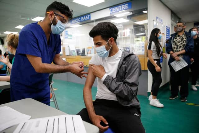 A new side effect for those receiving the Pfzier and Moderna jabs has been added to the official list by the UK medicines watchdog (Photo: Hollie Adams/Getty Images)
