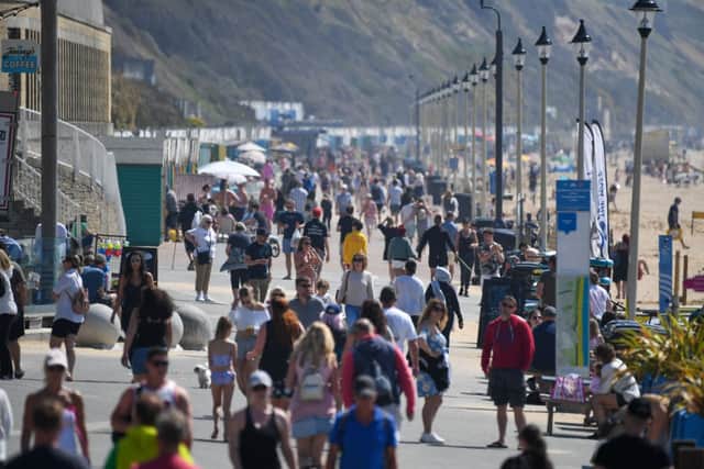 People across the country flocked to beaches in the hot weather. (Photo by Finnbarr Webster/Getty Images)