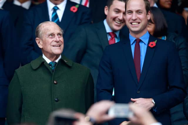 Prince Phillip and Prince William enjoy the build up to the 2015 Rugby World Cup Final match between New Zealand and Australia at Twickenham Stadium (Photo by Phil Walter/Getty Images)