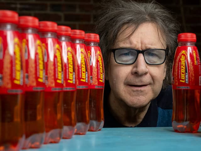 Garry Johnson is addicted to Lucozade and drinks 8 bottles of the bright orange drink a day. 