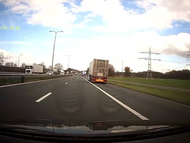 Tyre flies off car on the motorway.