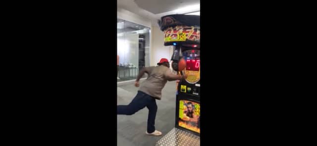 Man misses punch bag and hits boxing machine.