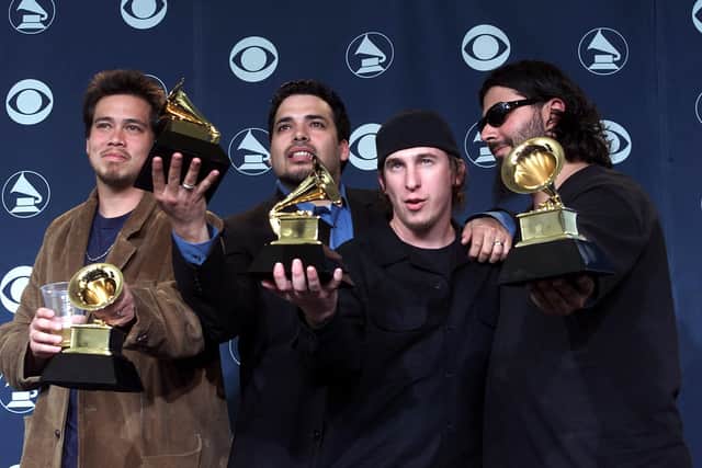 Deftones pose with their Grammy Awards for Best Metal Performance for their song "Elite", backstage at the 43rd Annual Grammy Awards in Los Angeles 21 February 2001