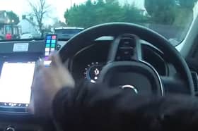 Disqualified driver jumps from moving car during police chase.