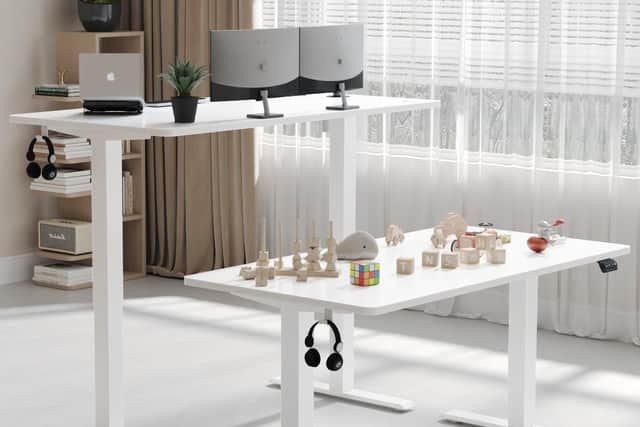 Electric standing desks just glide up to your favourite height and stay there until you want to sit down again