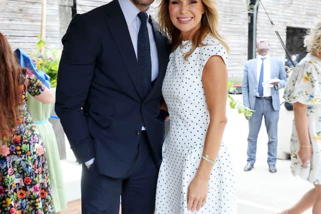 David Gandy and Amanda Holden during Queen Camilla's visit to unveil the new RHS and BBC Radio 2 'Dog Garden',