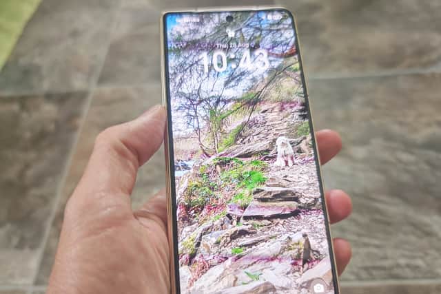 The main display has small bezels and it's seriously bright
