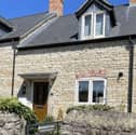 Charming Woodford cottage 2-bed stone terrace with garden & private parking for £320,000