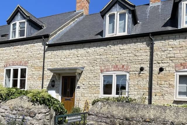 Charming Woodford cottage 2-bed stone terrace with garden & private parking for £320,000
