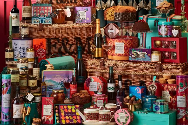 Fortnum & Mason’s Sovereign Hamper, priced at £2,500, includes 58 luxury items ranging from champagne and whisky to puddings, biscuits, truffles and festive decorations.
