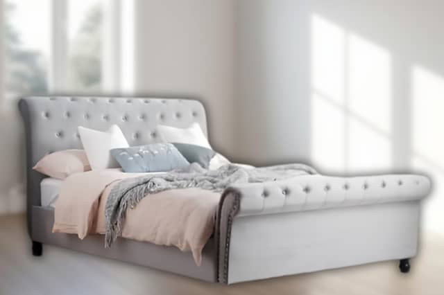 The ShopHomeStyle Opulent king size bed frame features a plush grey finish and classic statement styling.
