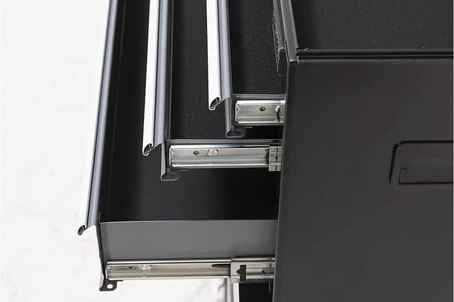 Handy drawers roll out easily to keep your tools at hand