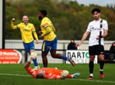 Zayn Hakeem celebrates scoring Wellingborough's third goal in their 4-1 win at Corby Town on Saturday (Picture: Rob Webb)