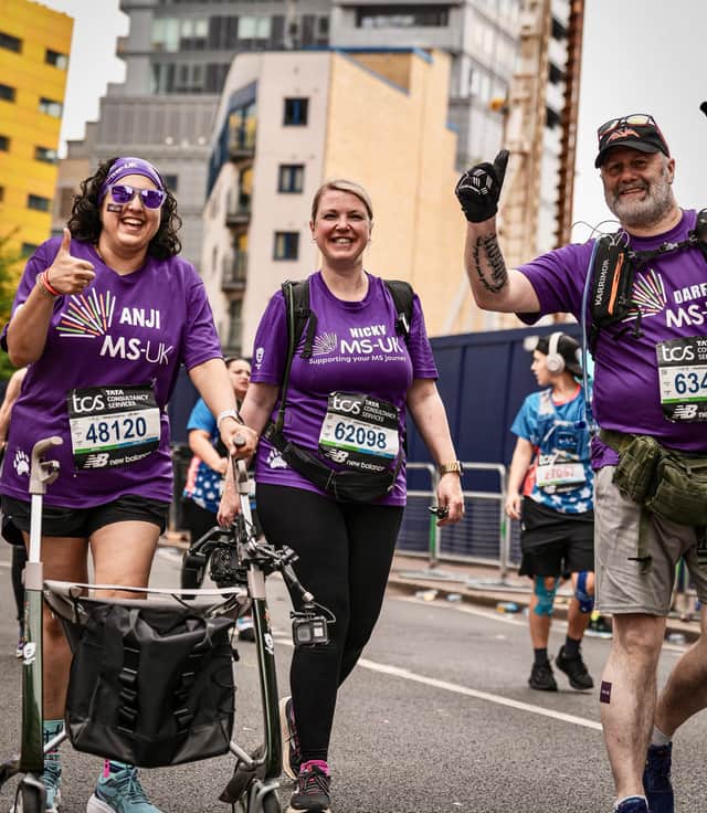 Anjali Silva-Vadgama, Nicky Hagan and Darren S. Cook during the TCS London Marathon 2025