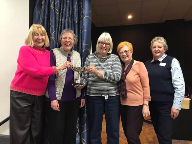 Cranford WI holding the winners cup, presented by County Chairman Chris Carr