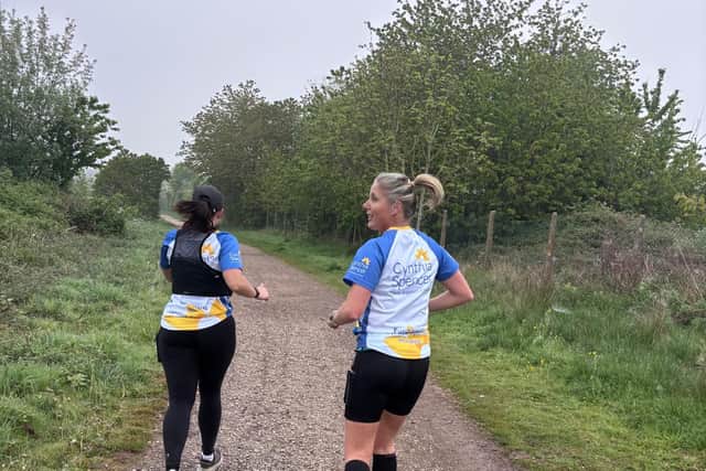 Hannah and Michelle on a recent 31 mile training run 
