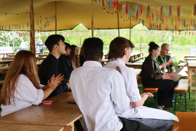 Students from Northampton, Moulton, and Tresham Colleges gather to hear the results of the competition.