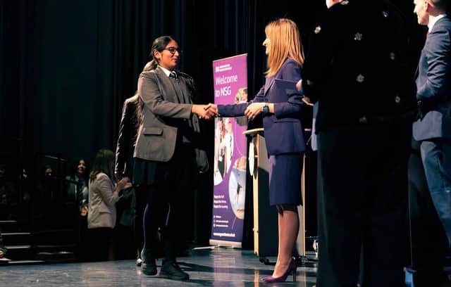 Cristina Tabaoda-Naya (Headteacher) presenting prizes at Awards Evening