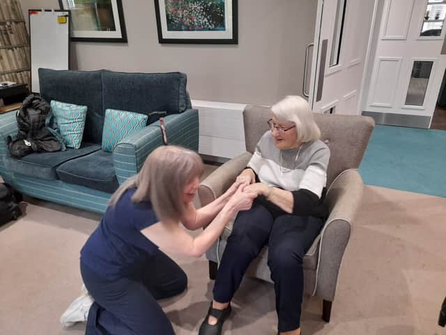 Resident enjoying having a fun exercise session