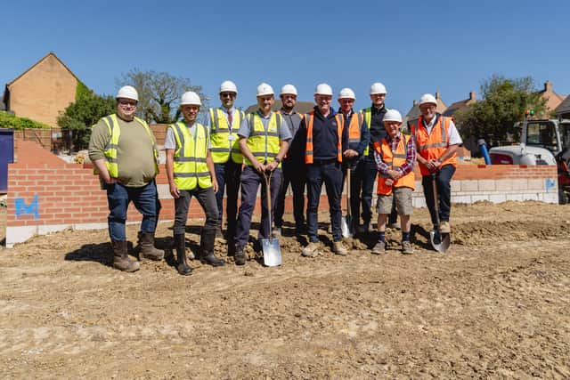 Partners from Northamptonshire Rural Housing Association, emh, Kings Cliffe Parish Council, North Northamptonshire Council, Snowdon Homes, and CPC Project Services mark the start of development of 10 affordable homes in Kings Cliffe.