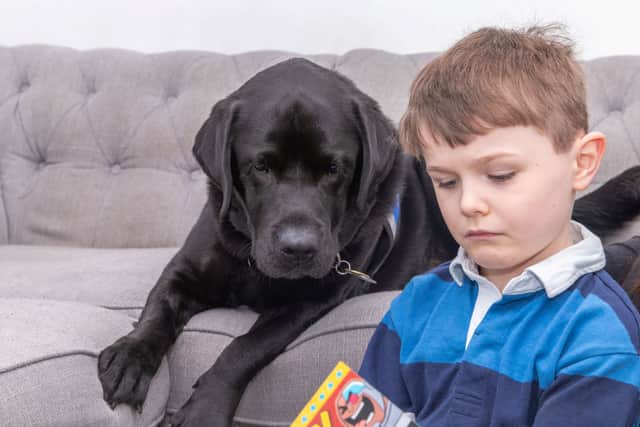 Carter and his best friend, support dog Davey