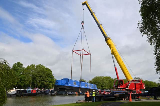Narrowboat craned into Crick Marina ahead of the Crick Boat Show, to be held over the bank holiday weekend.