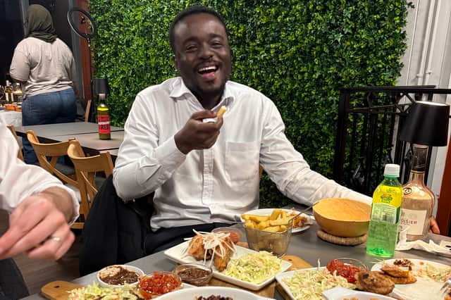 Bismark celebratng his new qualification