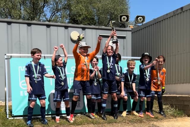 Geddington Montrose FC U8s lift the Plate Trophy after success at Earls Barton’s annual tournament.