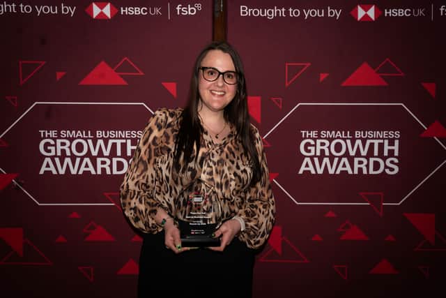 Marie Baker collecting the award.
