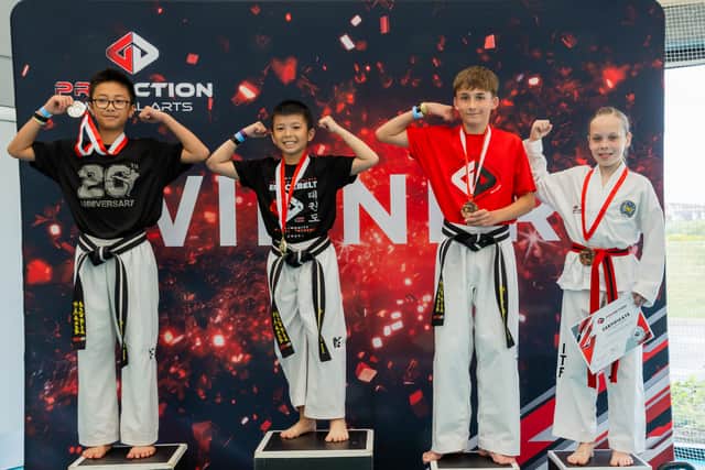 Proaction Martial Arts Students celebrating their medals at the Proaction In-House Competition.