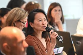 Audience members speak to researchers at The Psoriasis Association annual conference, 2025