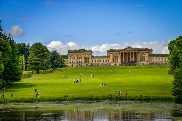 View across the Octagon Lake towards Stowe House on a busy summer’s day.