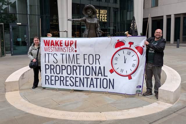 MVM supporters in front of Rise Up, Women in St Peter's Square, Manchester