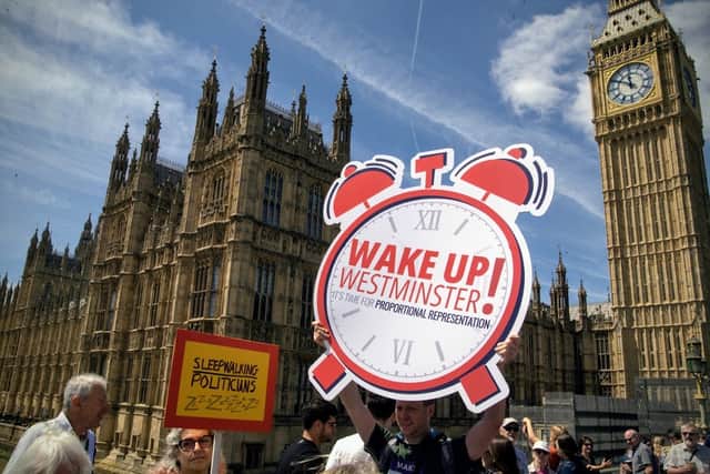 MVM marchers on Westminster Bridge, opposite Parliament