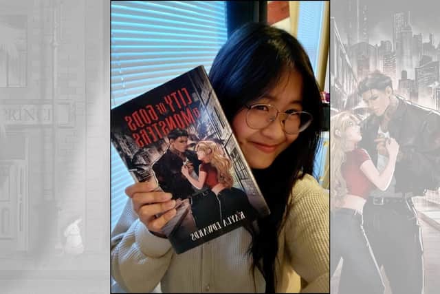 Annie Nguyen pictured next to her cover design for Owlcrate.
