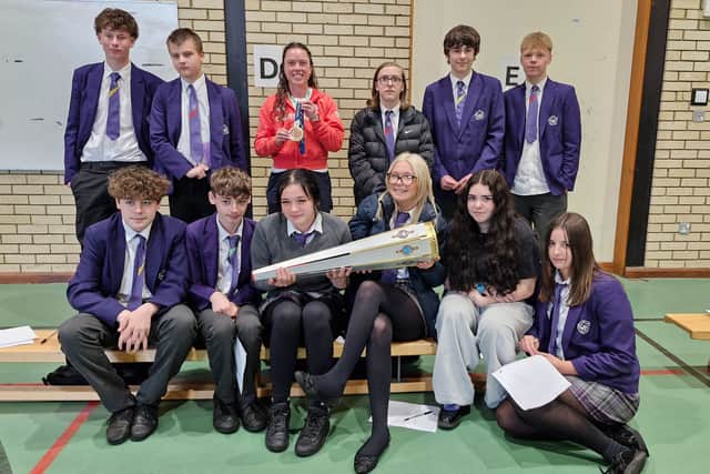 Students at Prince William School with Olympic hockey player Grace Balsdon