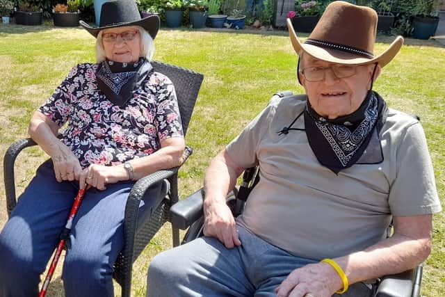 Residents enjoying the Country & Western afternoon in the glorious sunshine