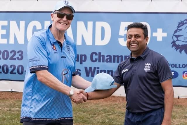 Mukesh R bhatt receiving debut cap from Peter R.