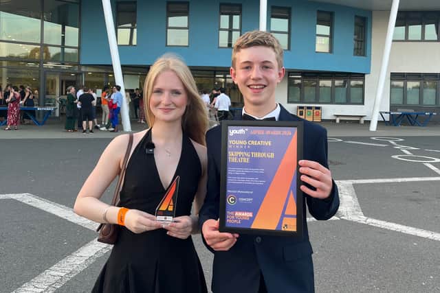 Nathan Hargreaves, from Bedfordshire, and Maddie Thornton, from Northamptonshire, celebrate after receiving the YouthTV Young Creative Award in recognition of their podcast, Skipping Through Theatre.