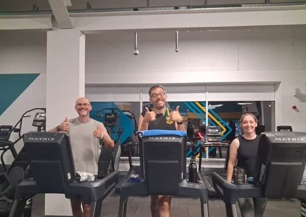 The original trio keeping spirits high! Mark, Dave, and Georgina powering through their 24-hour treadmill relay at PureGym Rushden.