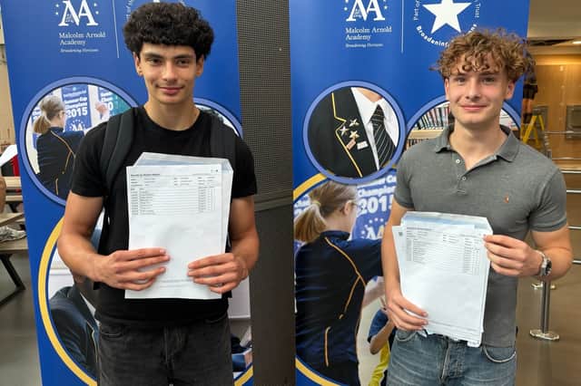 David and Olly with their results