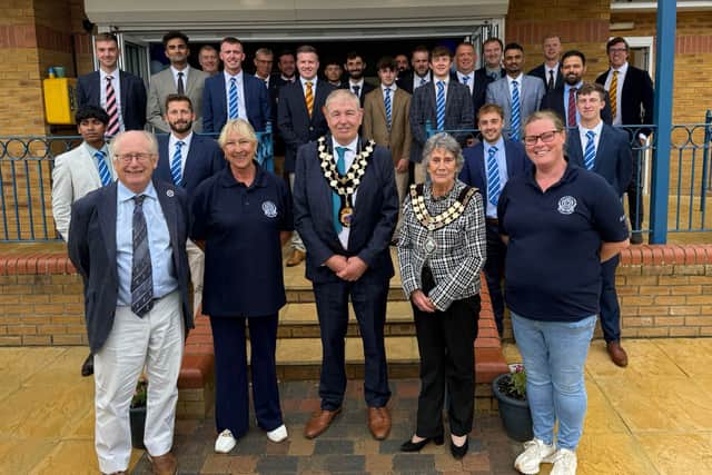 Photo features; (front row left to right) MCC scorer, President of RHTCC, Mayor of Higham Ferrers, Mayor of Rushden & RHTCC Chairwoman. Background; RHTCC & MCC players.