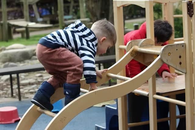 Developing gross motor skills and co-ordination during access to the outdoor gardens all day at Parklands