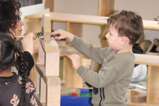 Reviewing his learning alongside a skilled practitioner.