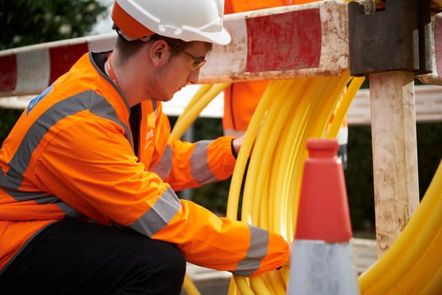 Cadent engineer preparing gas pipe at a work site