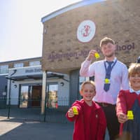 Allison Homes Central marks International Walk to School Month by donating 450 hi-vis bag tags to local schools